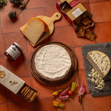 Host with the Most selection gift set Castkill Provisions Honey, Fine Cheese Co Olive Oil & Sea Salt Crackers, Nancy's Cemembert, Marieke Premium Gouda, Bayley Hazen Blue Cheese