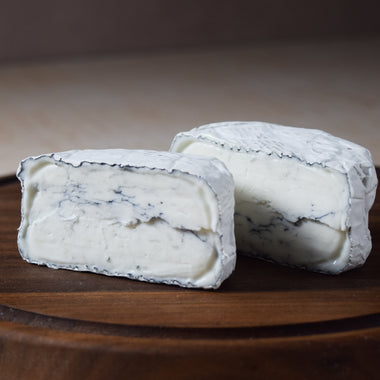 Sandy Creek goat's milk ashed bloomy rind cheese Goat Lady Dairy