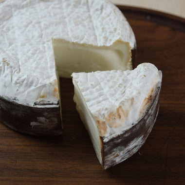 Merry Goat Round Spruce Reserve bark wrapped goat's milk cheese Firefly Farms