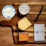 saxelby cheesemongers cheese of the month club gift - a selection of three cheeses. Cheesemongers pick. 
