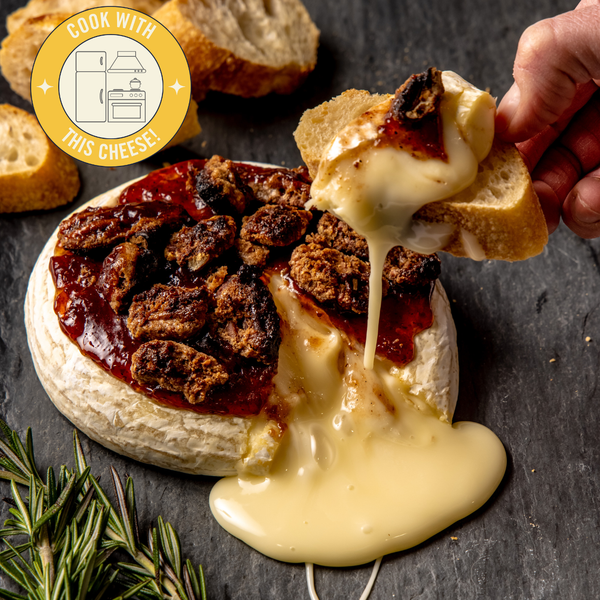 Baked Brie set gift- a gooey cheese toasted with nuts and strawberry jam with sliced baguettes. cook with this cheese. 